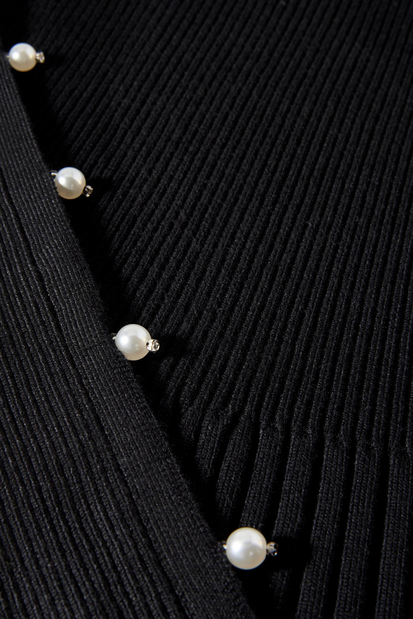 Black sweater with pearls on outlet sleeves