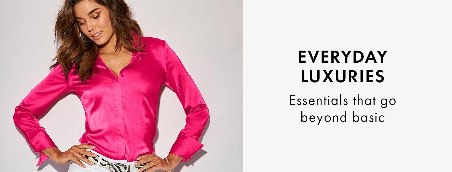The Beyond Basics Collection model wearing a hot pink button-down top.
