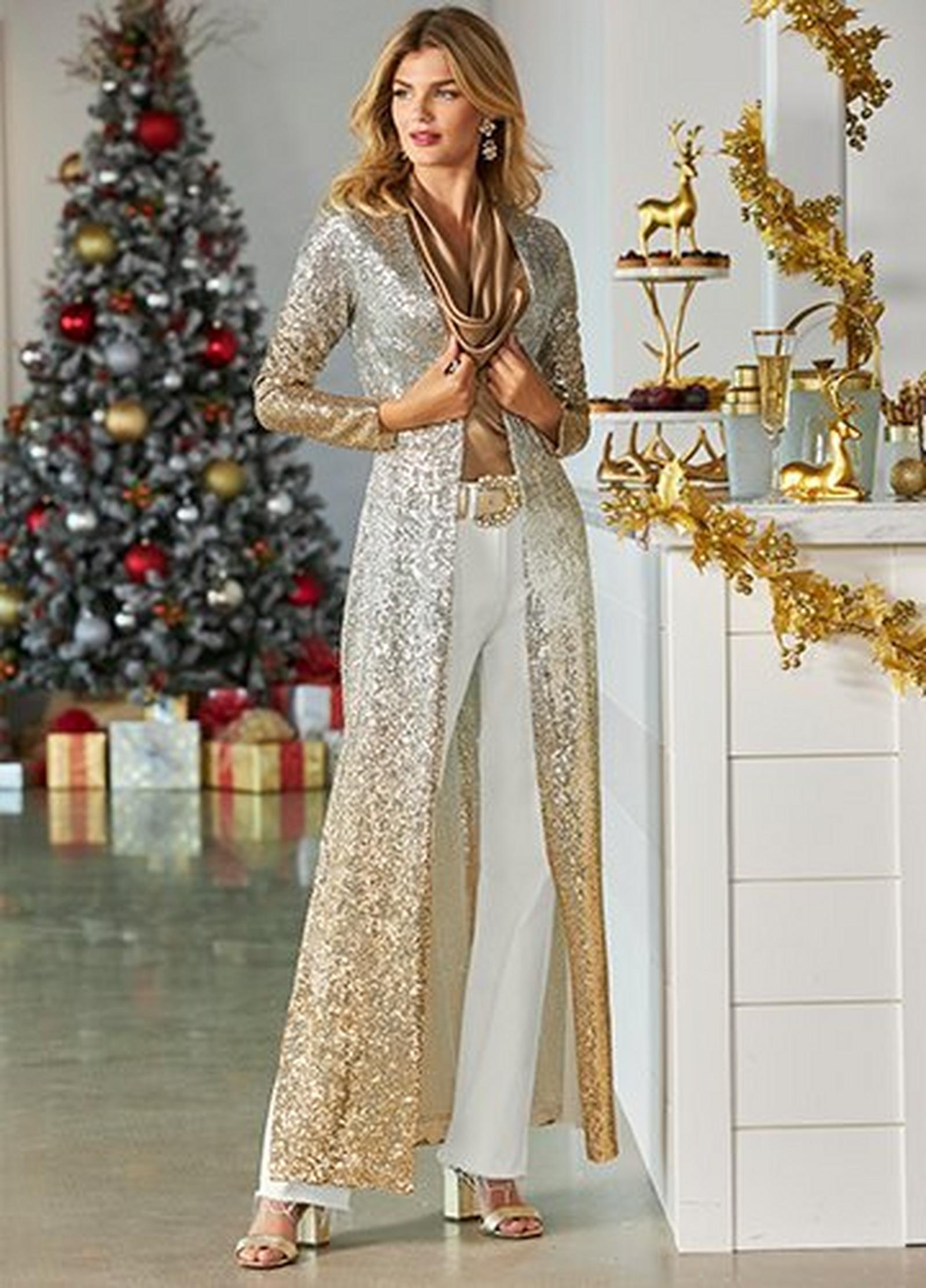 model wearing a silver and gold sequin ombre long duster, tan cowl neck sleeveless charmeuse blouse, gold rhinestone belt, and white bootcut jeans.