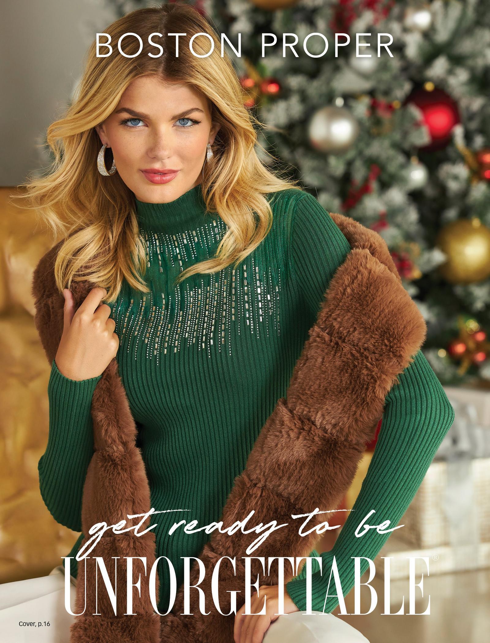 model wearing a green embellished turtleneck sweater, brown faux-fur scarf, and white pants.