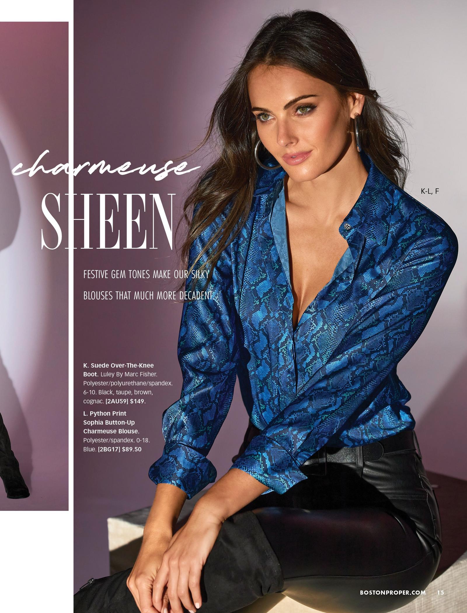 model wearing a blue python print button-down long-sleeve charmeuse blouse and black faux-leather pants.