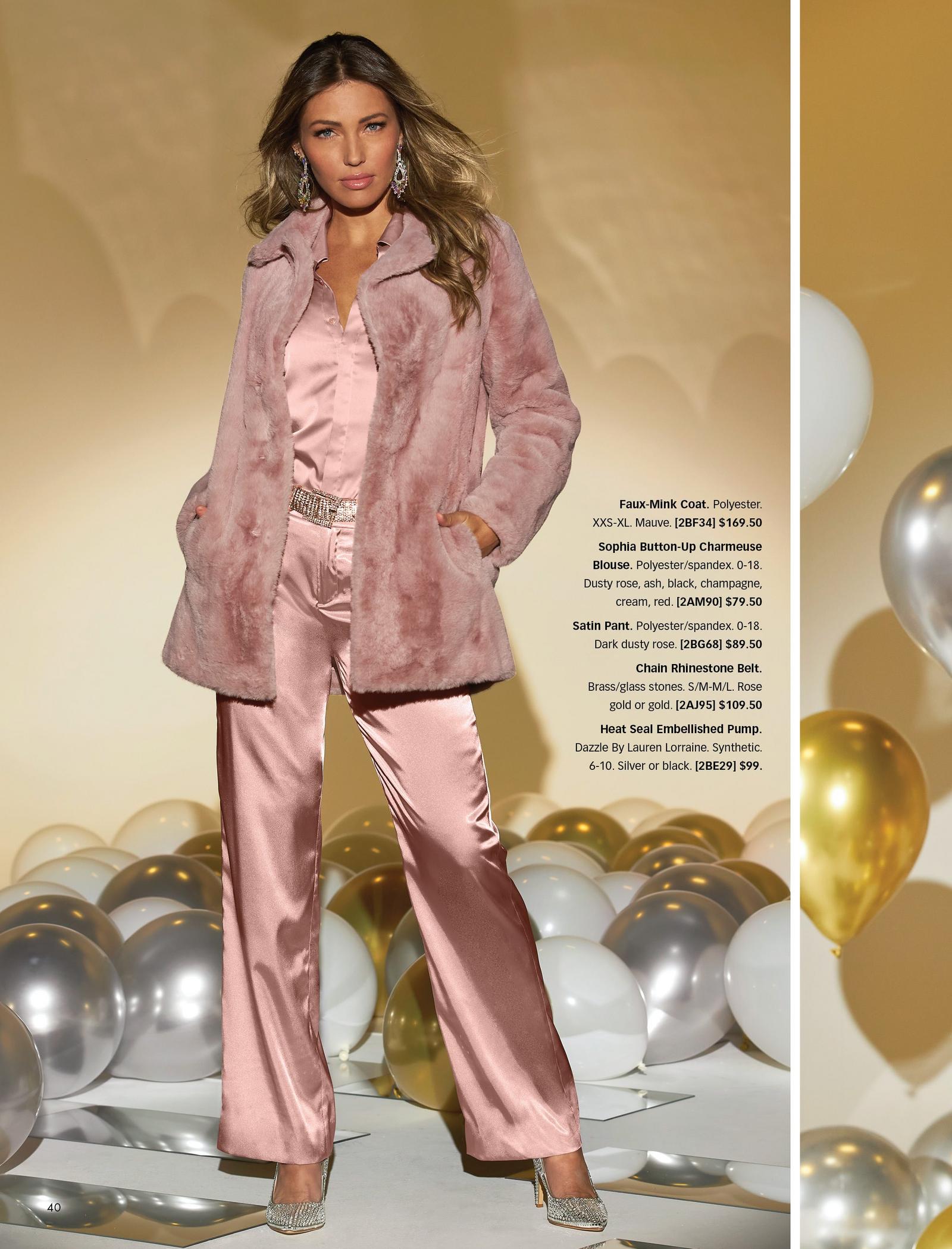 model wearing a light pink faux-fur coat, light pink button-down charmeuse blouse, light pink satin pants, and silver rhinestone pumps.