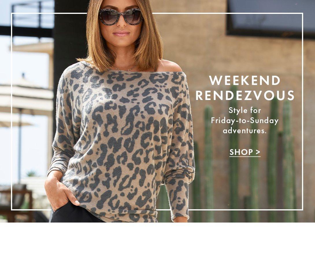 model wearing a leopard print off-the-shoulder sweater, black pants, and sunglasses.