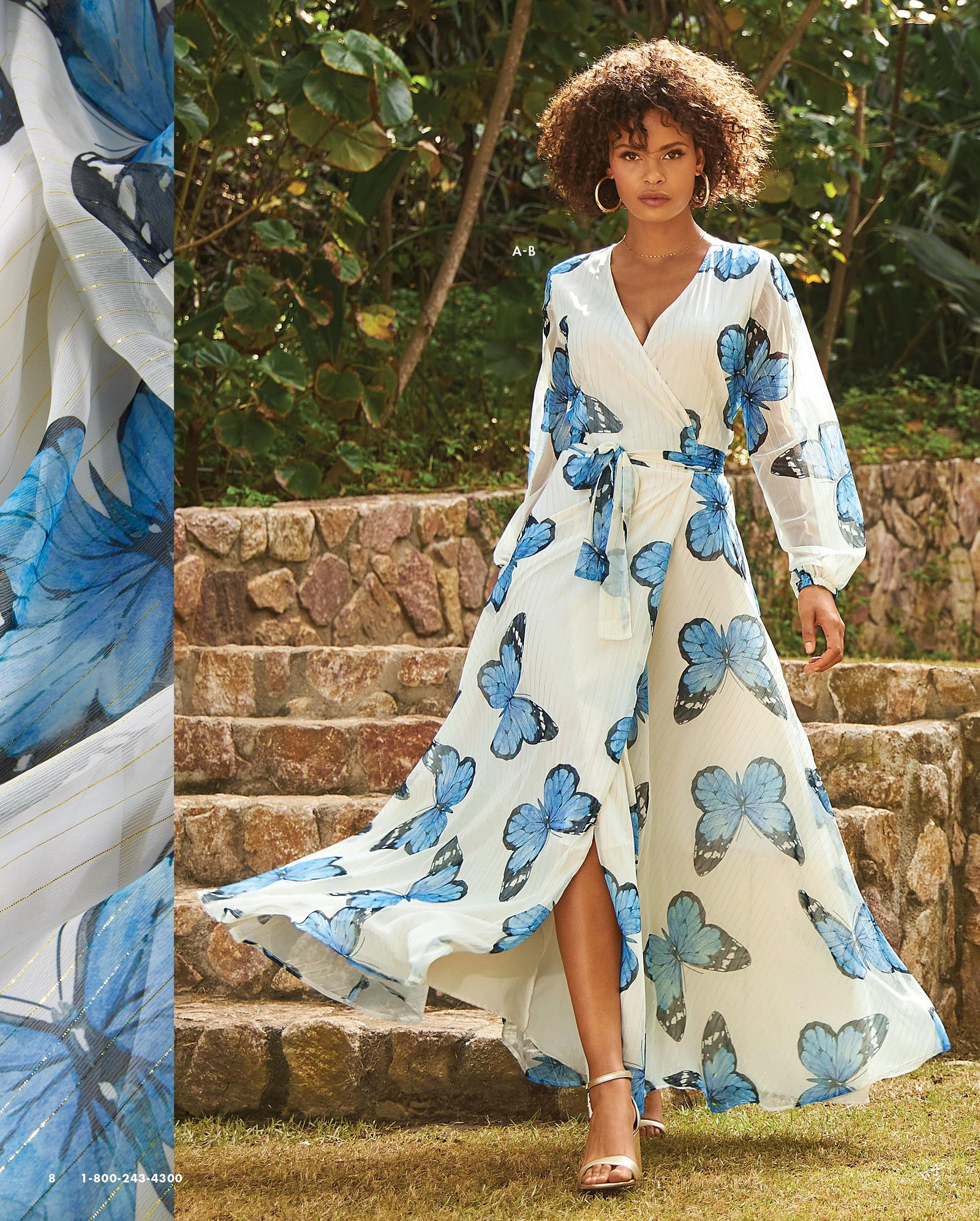 model wearing a white and blue butterfly print long-sleeve wrap maxi dress, gold hoop earrings, and silver heels.
