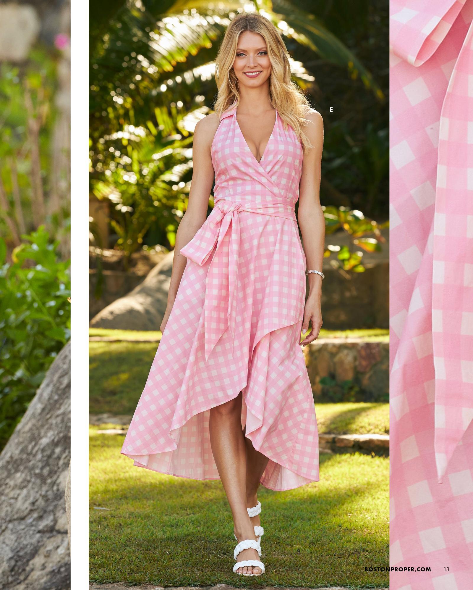 model wearing a pink and white gingham halter neck high-low maxi dress and white braided sandals.