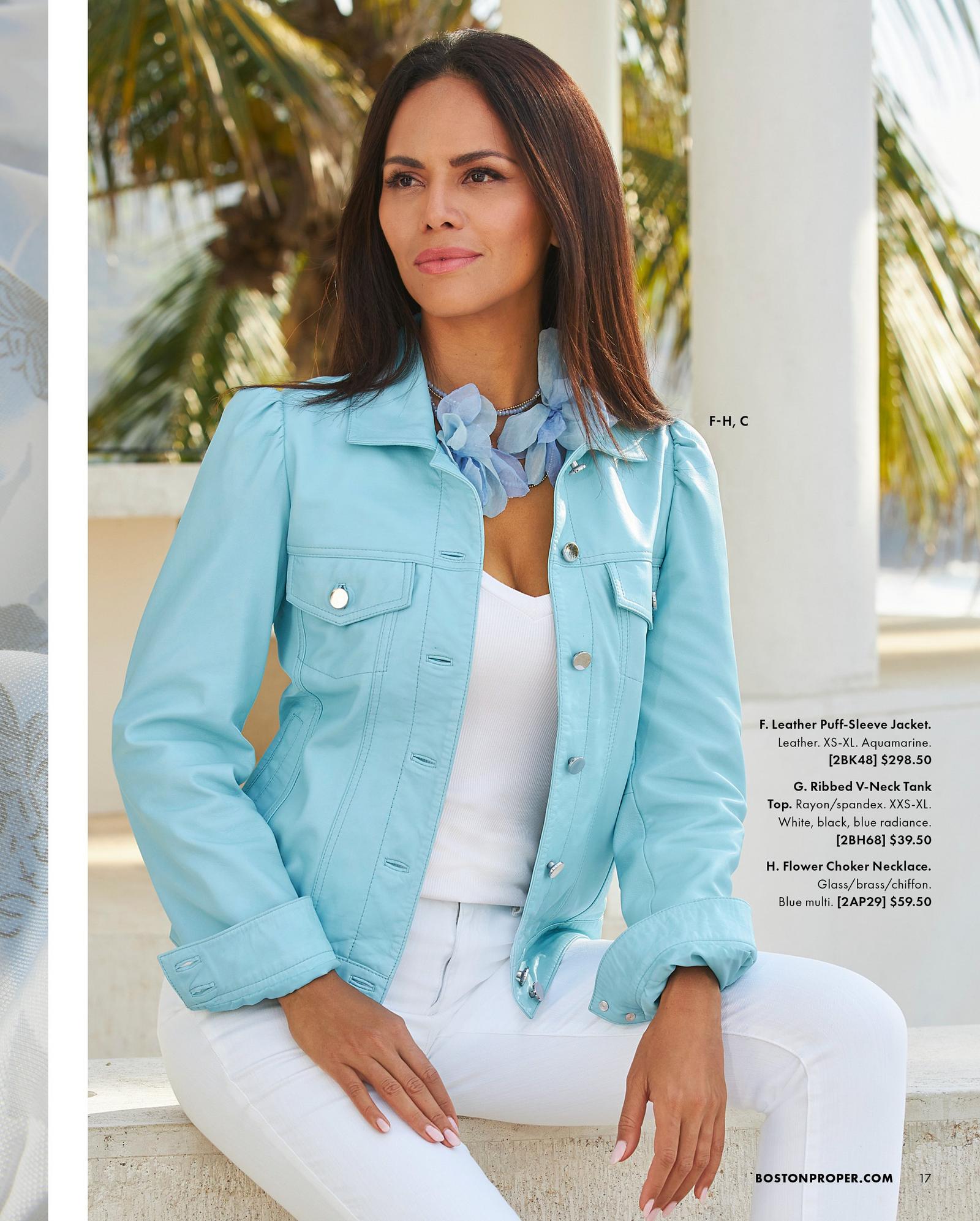 model wearing a light blue leather puff-sleeve jacket, white v-neck tank top, white jeans, and a blue flower choker necklace.