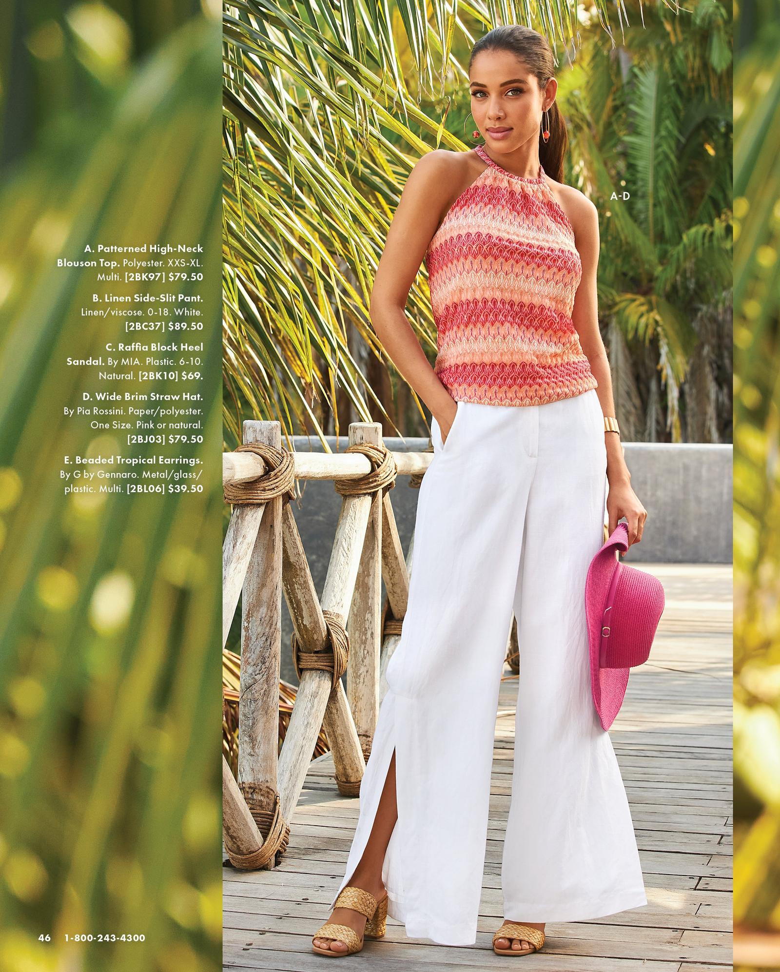 model wearing a multicolored high-neck sleeveless top, white linen side-slit pants, raffia block heels, and holding a hot pink wide brim hat.