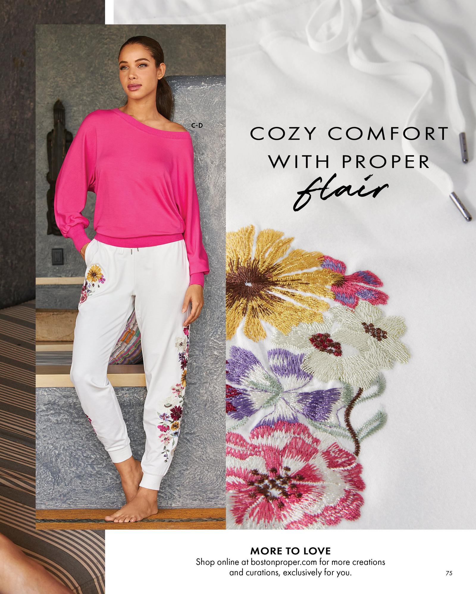 model wearing a hot pink banded slouchy long-sleeve top and white floral embroidered joggers.