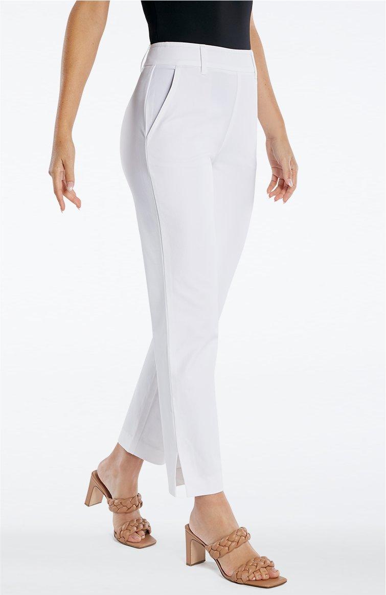model wearing white pull-on twill cropped pants, tan braided block heels, and a black top.