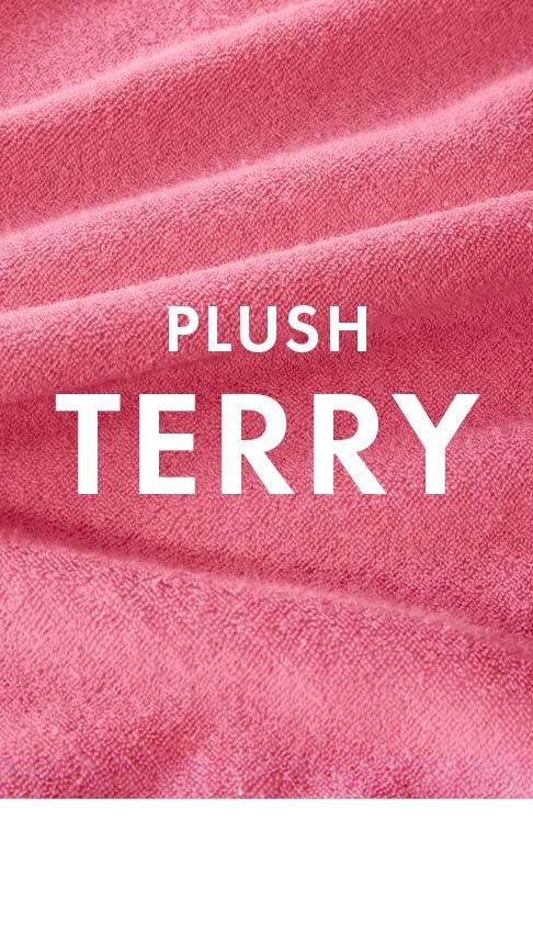 white text on pink terry cloth background.
