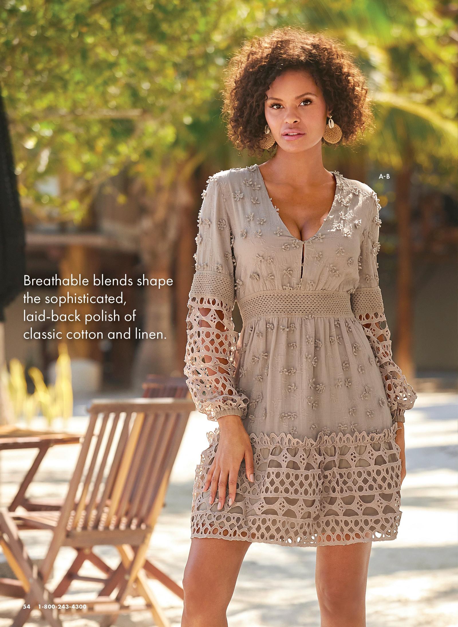 Model is shown wearing the Mixed Media Short Dress in beige with a keyhole detail at the bust, cutout puff sleeves and 3D floral applique. She also wears the Woven Seashell Earrings in tan wicker with shell detail.