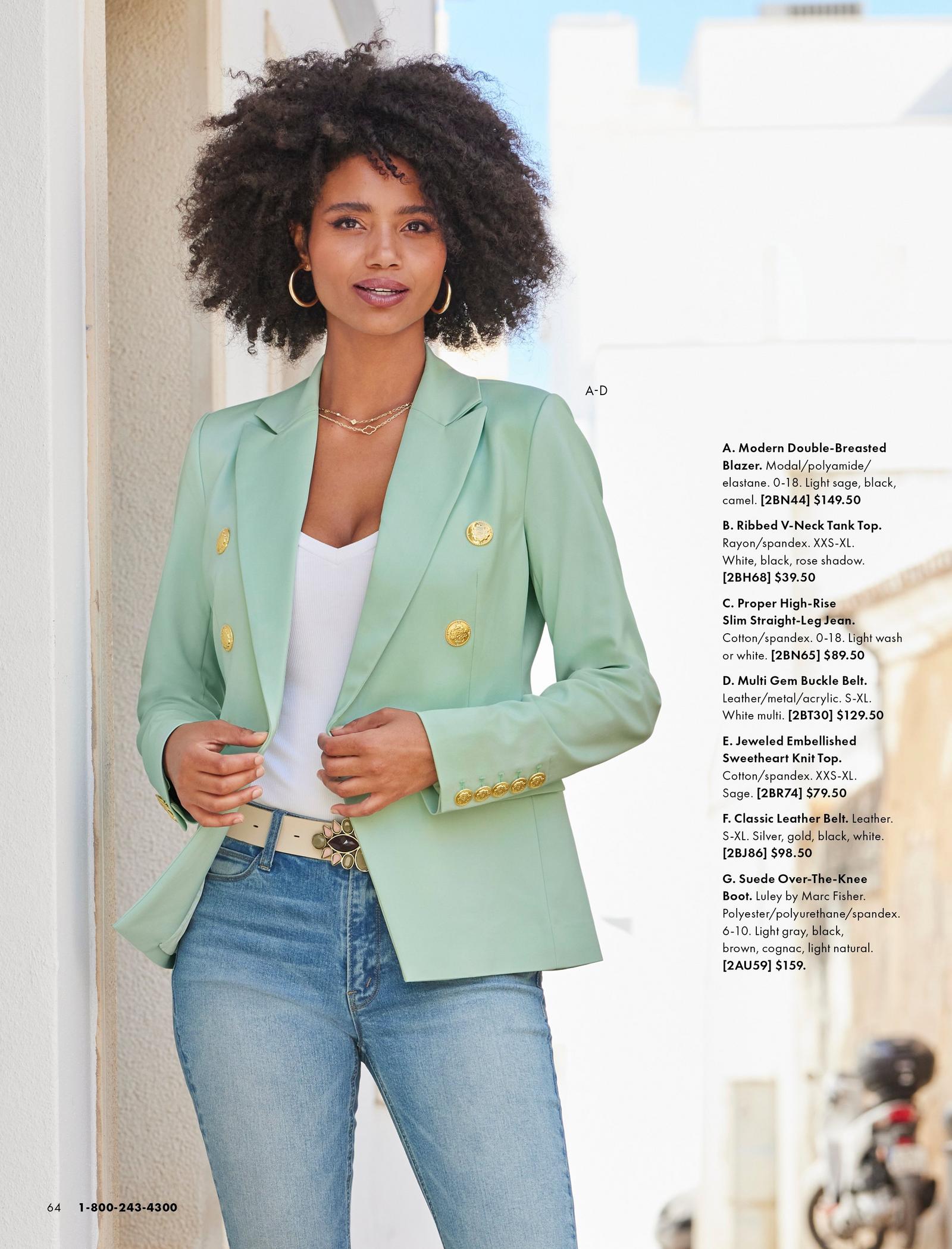 model wearing a sage double-breasted blazer, white top, stone embellished belt, jeans, and gold hoop earrings.