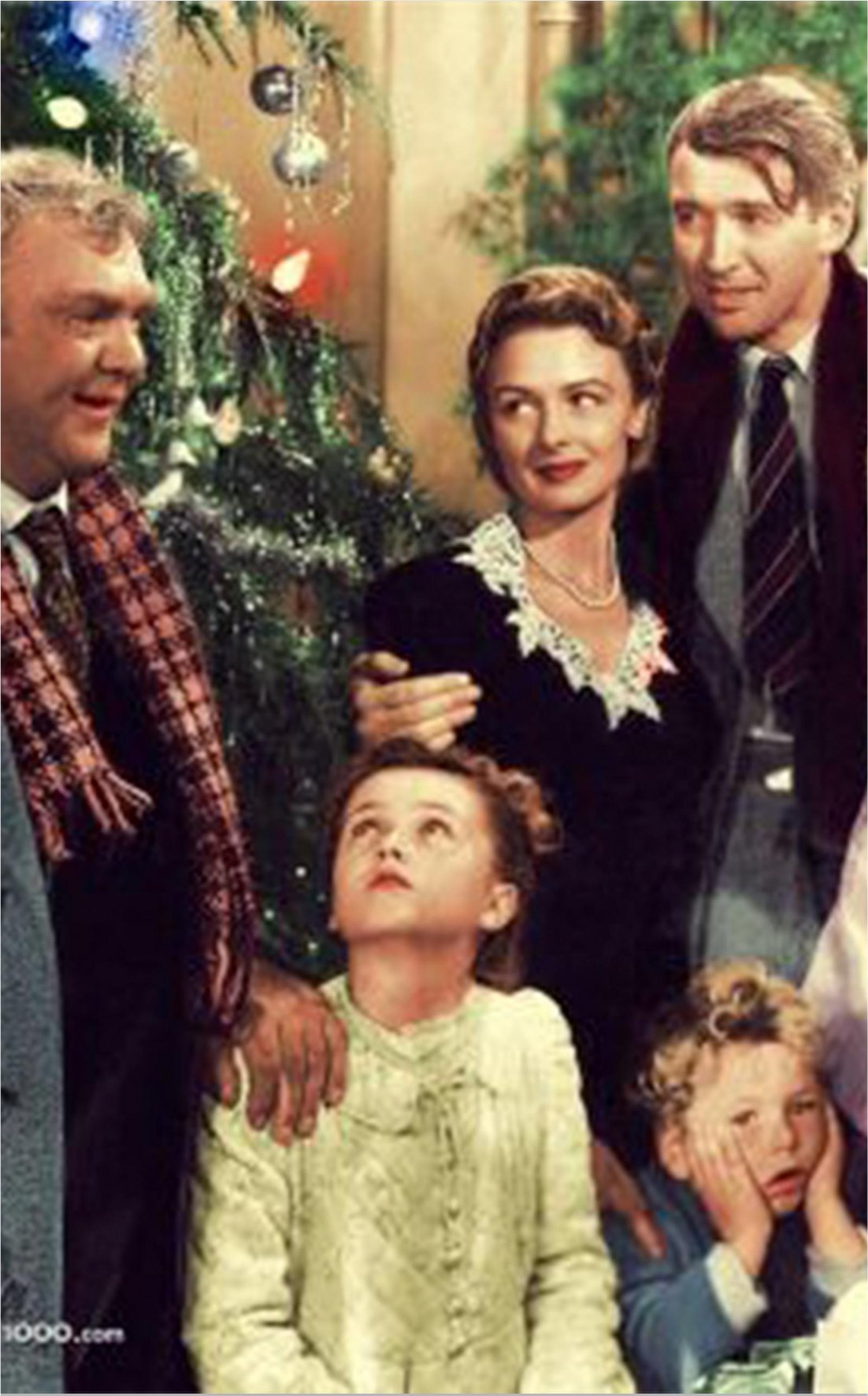 the family from it's a wonderful life. the mother is wearing a floral lined sweater.