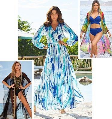 left model wearing a black one-piece swimsuit with gold embellishments and matching black sheer duster. middle model wearing a blue and white tie dye wrap maxi dress. right model wearing a blue bikini with high-waisted bottoms and a multicolored sheer duster.